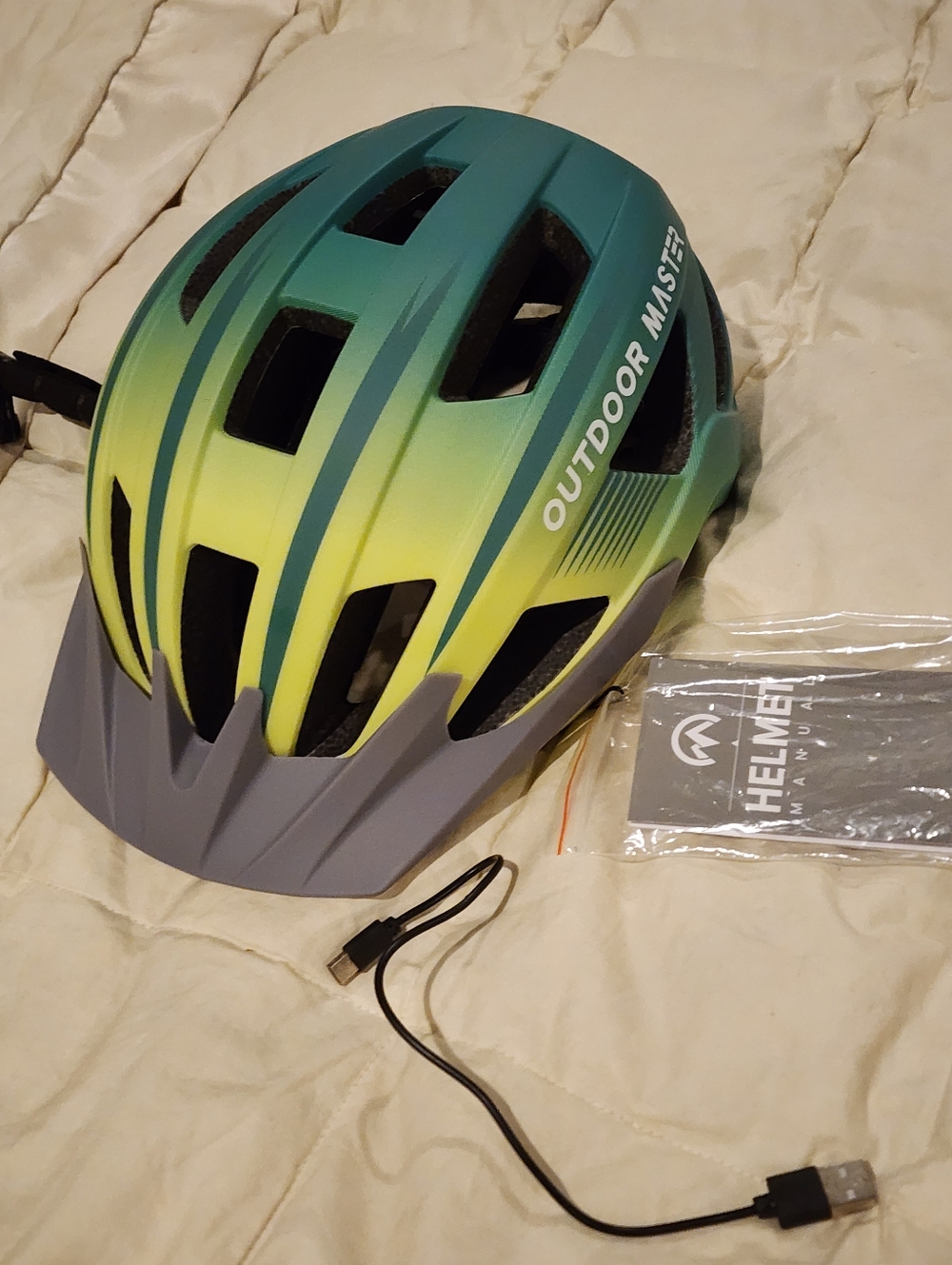 Outdoor Master Gradient Bike Helmet in Teal and Lime With Rechargeable Light. Nw